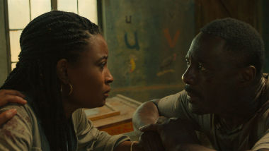 (from left) Meredith Samuels (Iyana Halley) and Dr. Nate Samuels (Idris Elba) in Beast, directed by Baltasar Kormákur.